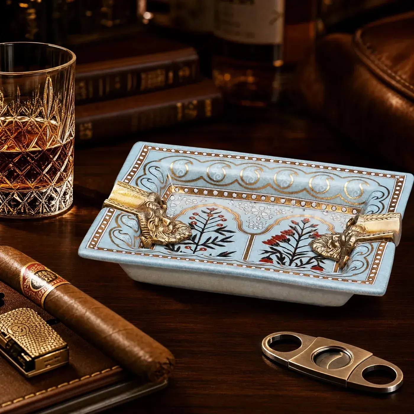Cigar Ashtray — blue with sculpted rests Powder-blue ceramic cigar ashtray with sculpted gold rests for club programmes