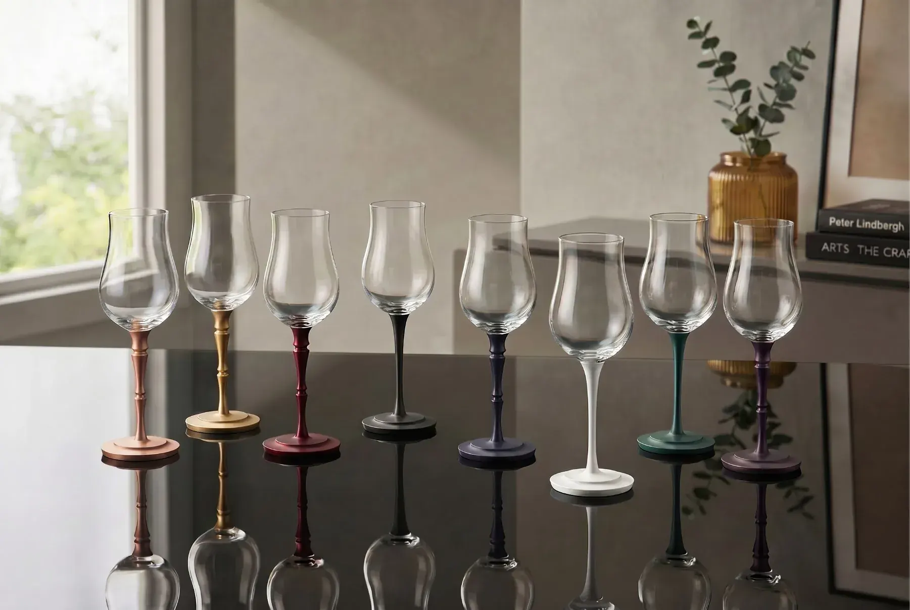 Crystal stemmed glass with hardwood stem on a tasting table Crystal stemmed glass with hardwood stem on a tasting table