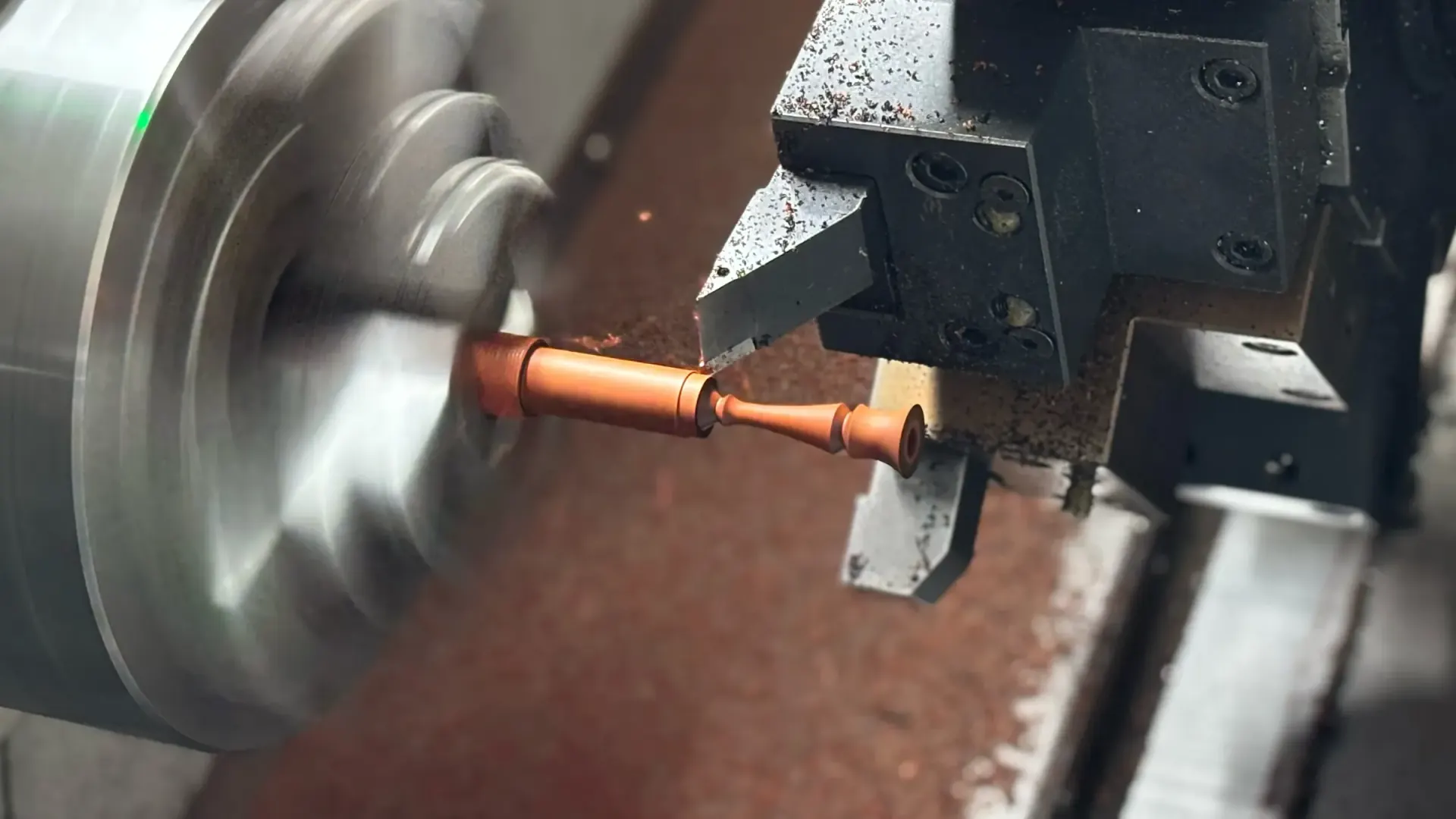 Metal stem being shaped on a CNC lathe Metal stem being shaped on a CNC lathe