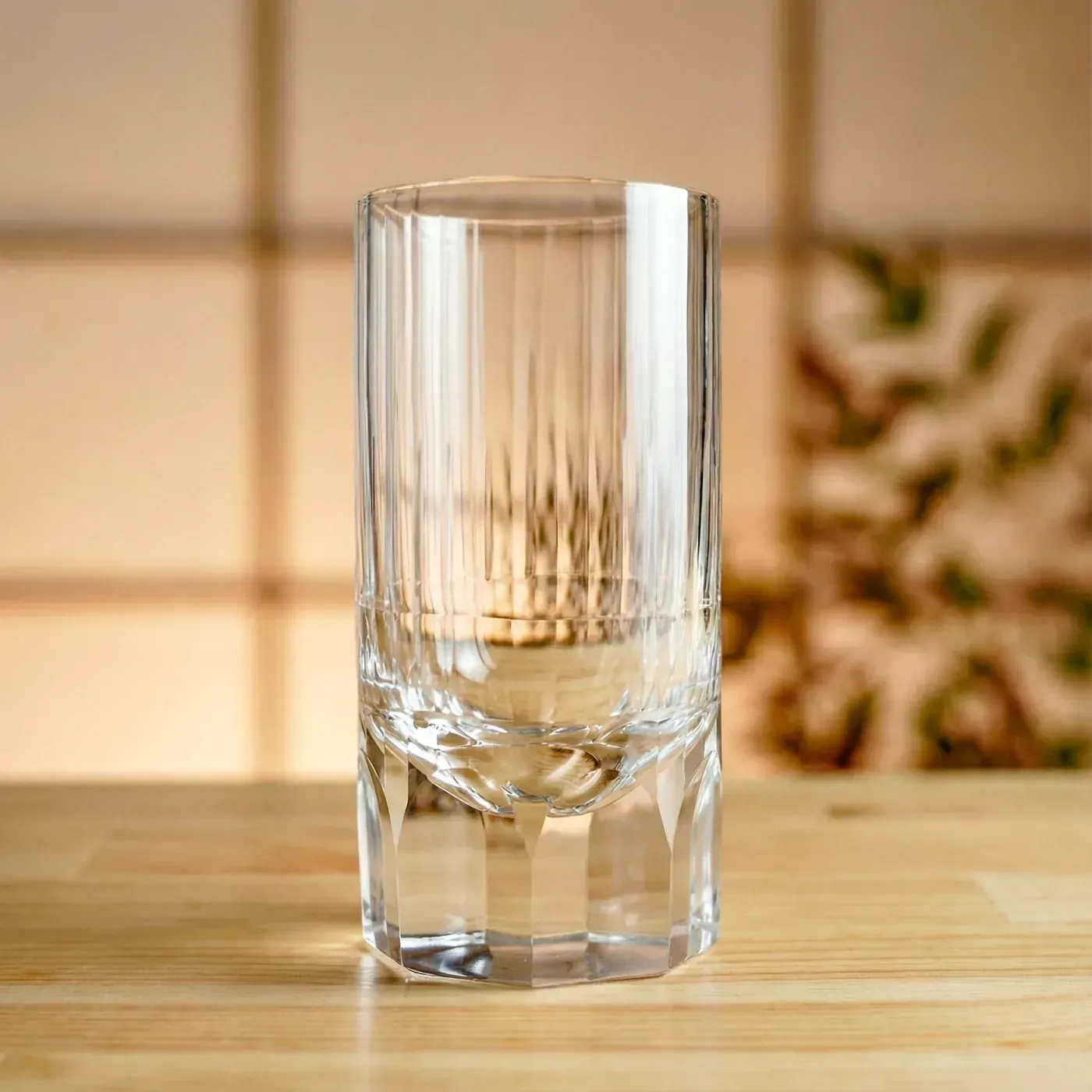 Edo Kiriko Glassware — tall crystal tumbler Tall clear Edo Kiriko tumbler with vertical ridges and hexagonal base facets