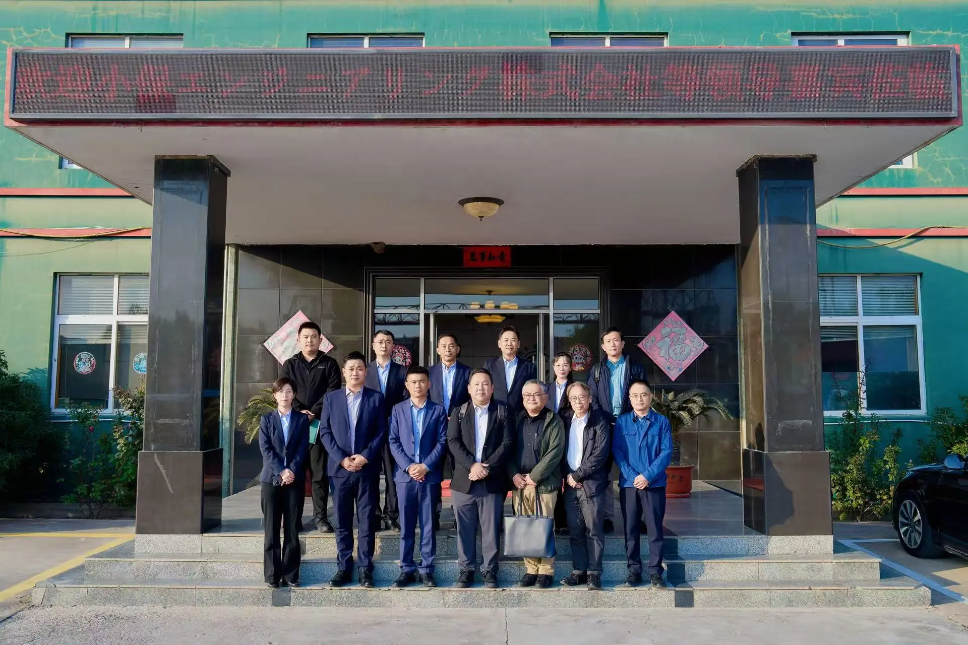Morika team and manufacturing partners outside a Qingdao partner workshop Morika team and manufacturing partners outside a Qingdao partner workshop