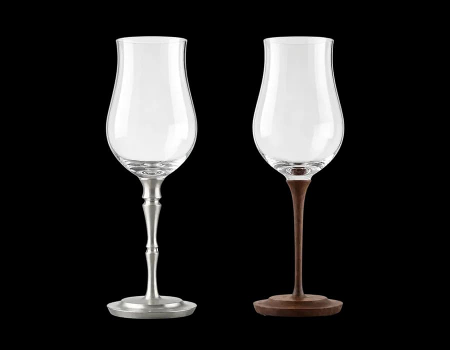 Crystal stemmed glass with CNC-machined wood stem on a neutral background Crystal stemmed glass with CNC-machined wood stem on a neutral background